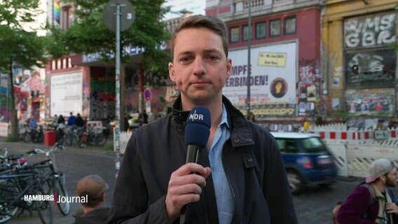 Der Reporter Simon Ritter berichtet aus dem Schanzenviertel. © Screenshot 