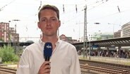 Die Schalte zum Unwetter an den Hamburger Hauptbahnhof. © Screenshot 