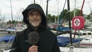 Thorsten Reinke berichtet aus Warnemünde. © Screenshot 