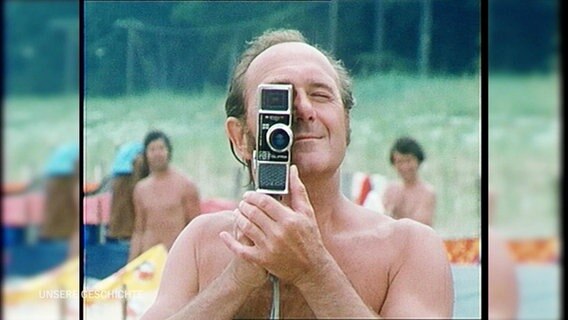 Urlauber mit Kamera © Screenshot 