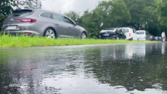 Überschwemmte Strasse. © Screenshot 