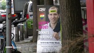 Beklebtes Wahlplakat der CDU. © Screenshot 
