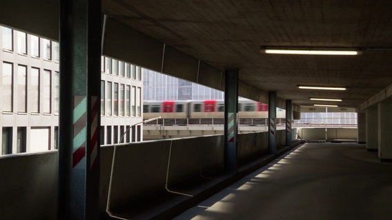 Blick auf die U-Bahn, die auf einem Viadukt am Parkhaus vorbei fährt. © Screenshot 