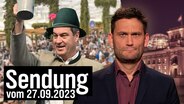 Der bayrische Ministerpräsident Markus Söder mit einem Trachtenhut und einem Bierkrug in der Hand, im Hintergrund ein Bierzelt von innen. Daneben Christian Ehring. (extra 3 vom 27.09.2023 im NDR Fernsehen) Der bayrische Ministerpräsident Markus Söder mit einem Trachtenhut und einem Bierkrug in der Hand, im Hintergrund ein Bierzelt von innen. Daneben Christian Ehring. (extra 3 vom 27.09.2023 im NDR Fernsehen) © NDR