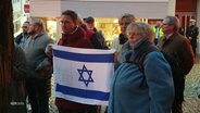 Menschen bei einer Pro-Israelischen Kundgebung. © Screenshot 