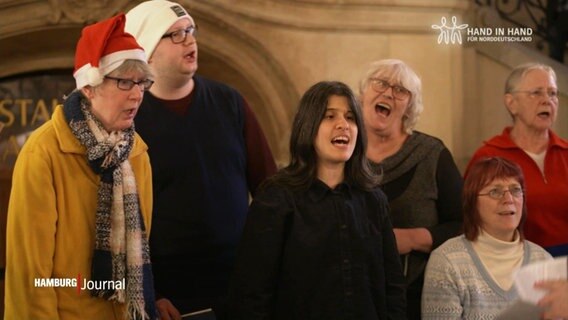 Der inklusive Chor der Lebenshilfe singt im Hamburger Rathaus. © Screenshot 