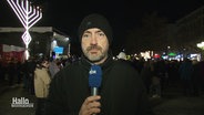 Reporter Jan Flemming berichtet vom Lichterfest am Opernplatz in Hannover © Screenshot 