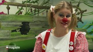 Eine Frau verkleidet als Clown. © Screenshot 