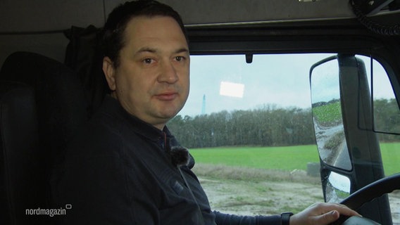 Der Spediteur Christian Franz am Steuer eines Lastkraftwagen. © Screenshot 