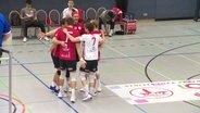 Volleyballer feiern einen Punktgewinn. © Screenshot 