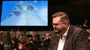 Der Streamer Staiy spielt Videospiele in der Elbphilharmonie. © Screenshot 