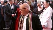 Regisseur Volker Schlöndorff bei einer Filmpremiere. © Screenshot 