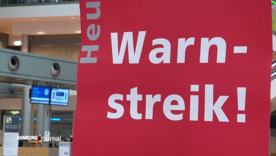 Ein rotes Schild mit der Aufschrift "Warnstreik!" © Screenshot 