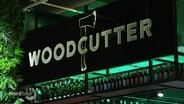Das Logo der Kneipe "Woodcutter". © Screenshot 