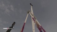 Das 66 Meter hohe Fahrgeschäft "Evolution" auf dem Hamburger Dom © Screenshot 