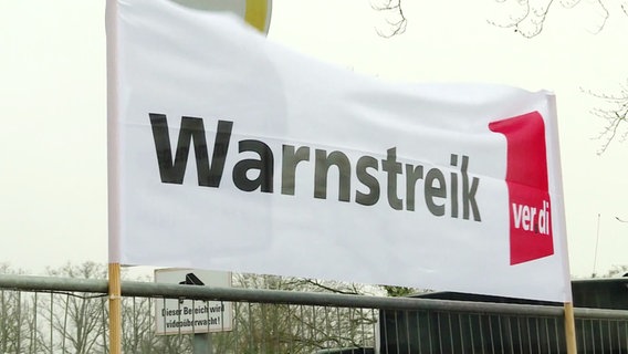 Banner mit der Aufschrift "Warnstreik". © Screenshot 