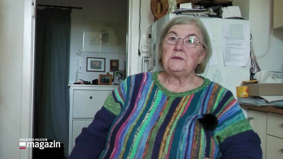 Eine ältere Dame spricht in die Kamera. © Screenshot 