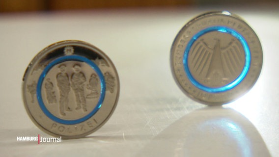 Eine neue Sammlermünze mit dem Motiv "Polizei" wurde vorgestellt. © Screenshot 