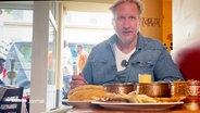 Der Koch Dave Hänsel zu Besuch im indischen Restaurant Badshah. © Screenshot 