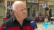 Walter Kienast, Vorstandsvorsitzender der Tafel Greifswald, gibt seine Einordnung zu den Wahlergebnissen bei der Europa- und Kommunalwahl 2024. © Screenshot 