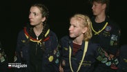 Verschiedene Teams treten beim traditionellen Nachlauf im Rahmen des Pfadfinderlagers der dänischen Minderheit in Tydal gegeneinander an. © Screenshot 