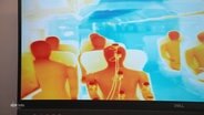 Ein Infrarotbild der Test-Dummies in einem ICE-Waggon, als Test für die Wärmeverteilung in einem Waggon der Deutschen Bahn © Screenshot 