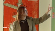 StartUp-Gründerin Sandra Heuer bei einer Präsentation. © Screenshot 