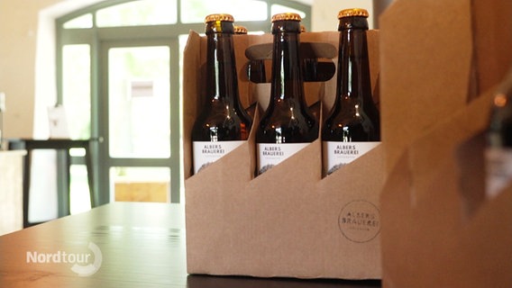 Drei Bierflaschen der Albers Brauerei. © Screenshot 