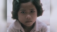 Ein vietnamesisches Mädchen in einem Ausschnitt aus einem "Weltspiegel"-Beitrag vom 17. April 1983.  