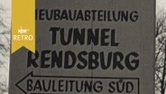 Handgeschriebenes Schild: "Neubauabteilung Tunnel Rendsburg - Bauleitung Süd"  