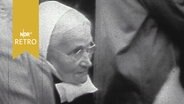 Nonne als Besucherin eines Kirchentags in den 1950er Jahren  