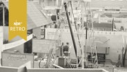 Blick in Messehalle Neumünster bei der Baufachmesse 1958  