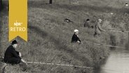 Angler am Weserdeich beim bundesweiten Anglertreffen 1960  