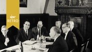 Sieben Herren des deutschen Bühnenvereins bei ihrer Jahrestagung 1961 in Lübeck  
