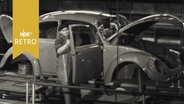 Arbeiter bei Montage eines VW-Käfers (1965)  