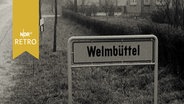 Ortsschild und Dorfbild Welmbüttel bei Heide 1960  