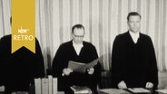 Drei Richter am Sozialgericht verlesen ein Urteil (1965)  