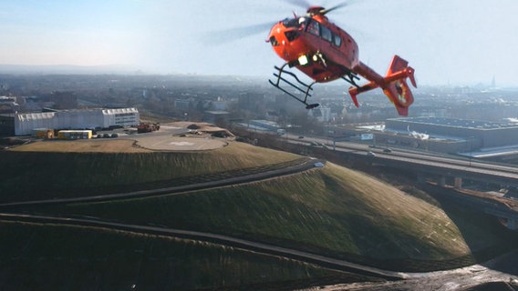 Hubschrauber über Baustelle.  