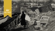 Zerstörungen in einem Wohngebiet nach der Sturmflutkatastrophe 1962  