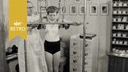 Kind bei der Übung in einem sog. "Schwebeläufer" zur Haltungskorrektur 1962  