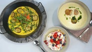 Omelett, Müsli-Frühstück und Suppe angerichtet auf einem Tisch. © NDR 