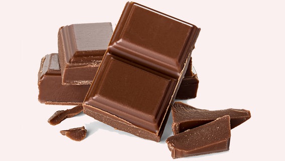 Mehrere Stücke Schokolade © Fotolia.com Foto: stockphoto-graf
