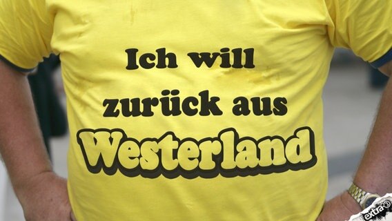 T-Shirts mit der Aufschrift "Ich will zurück aus Westerland".  