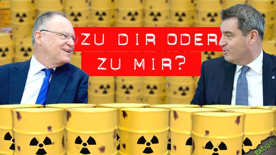 Der niedersäschsische MP Stephan Weil und der bayerische MP Markus Söder, umgeben von Atomfässern.  