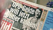 Bild Zeitungsschlagzeile: "UFO Sekte will jetzt Hitler klonen".  