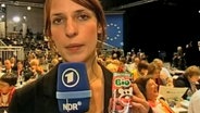 Eine Reporterin auf dem CDU-Parteitag.  