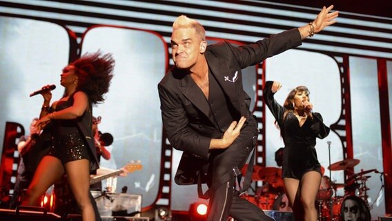 Robbie Williams während seines Auftritts zum 10-jährigen Thronjubiläum von Fürst Albert © dpa - Bildfunk Foto: Jean-Pierre Amet