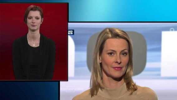 Eine Frau dolmetscht Anja Reschke in Gebärdensprache.  