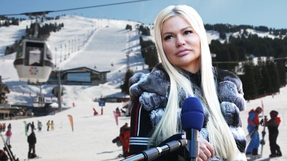 Thumbnail: Eine blonde Frau steht vor einer Ski-Piste und spricht in ein Mikrofon. © NDR Foto: screenshot