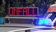 Polizeiauto mit Signal "Unfall"  
